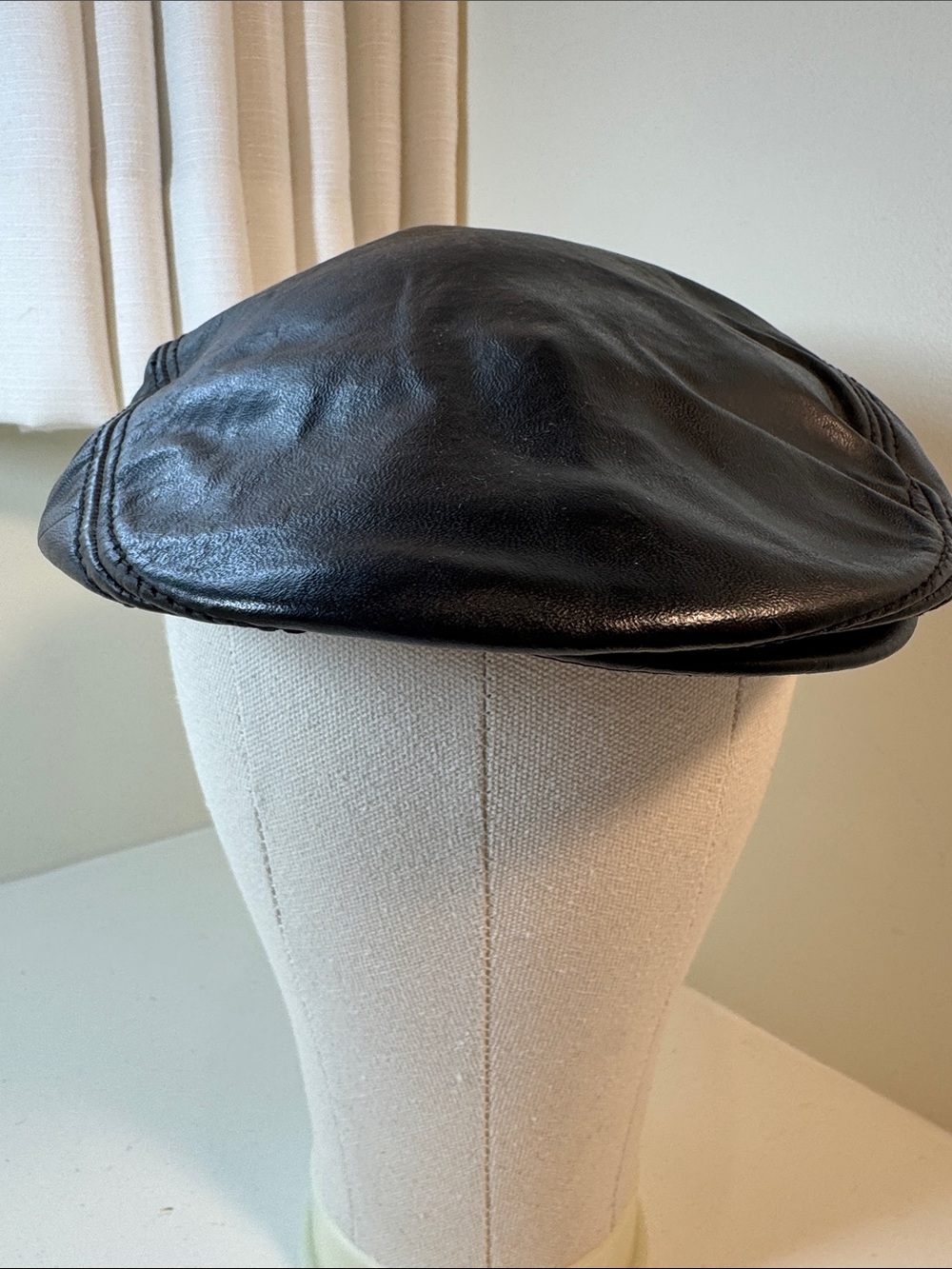 Wilson’s Leather Vintage black leather flat cap. S.